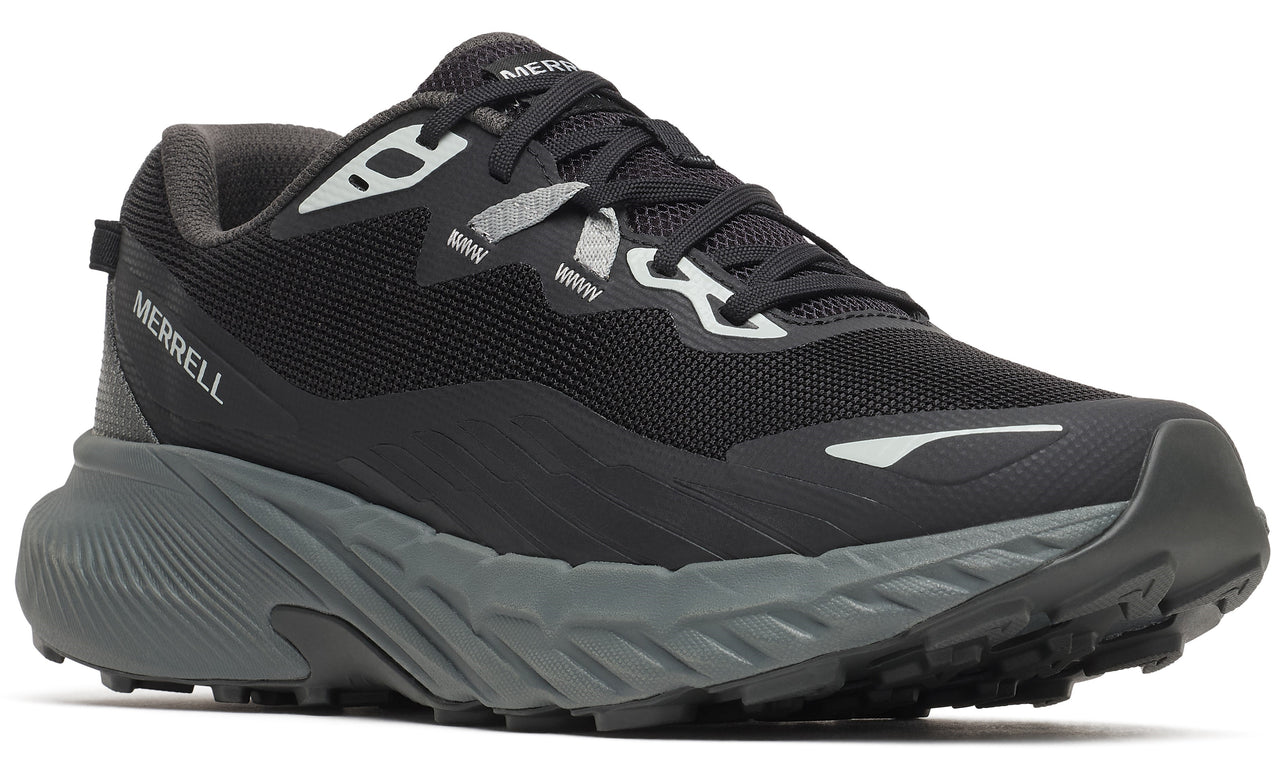 A black running shoe with a gray sole and silver accents.