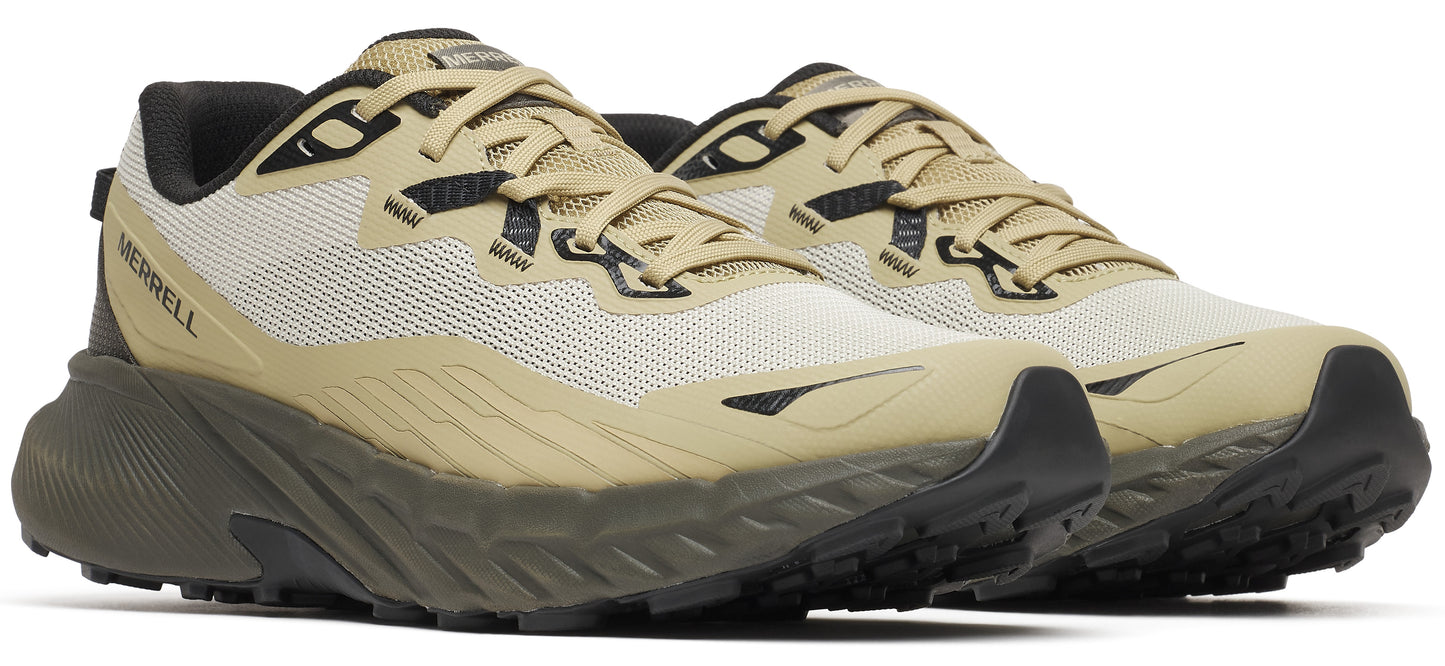 A pair of khaki-colored trail running shoes with black accents.