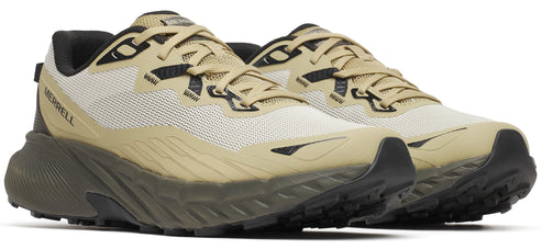 A pair of khaki-colored trail running shoes with black accents.