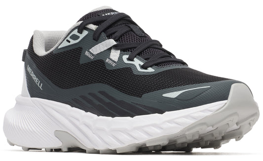 A black and gray trail running shoe with white sole and gray tread.