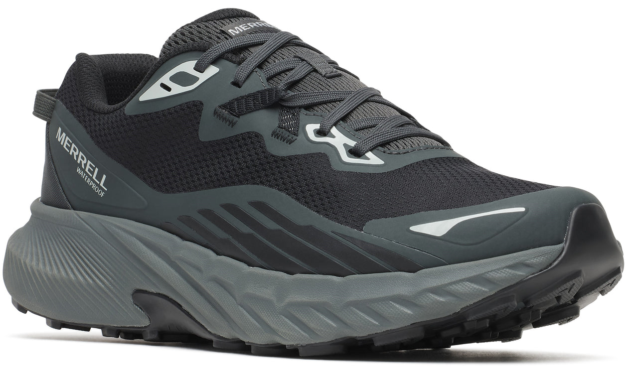 Black running shoe with gray sole and white accents.