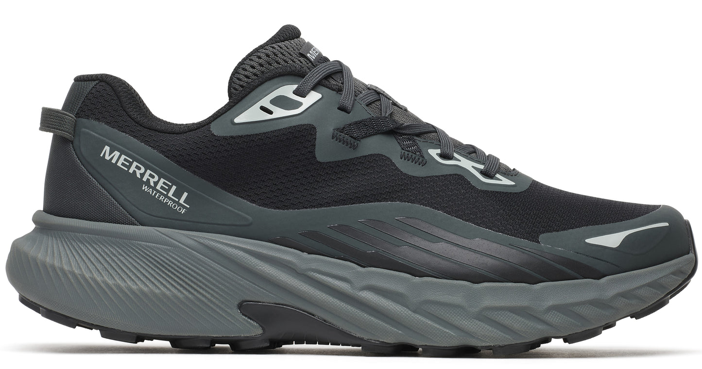 Black athletic shoe with gray sole and the word "MERRELL WATERPROOF".