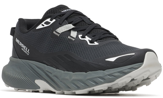 A black trail running shoe with gray rugged sole, Merrell logo on heel.