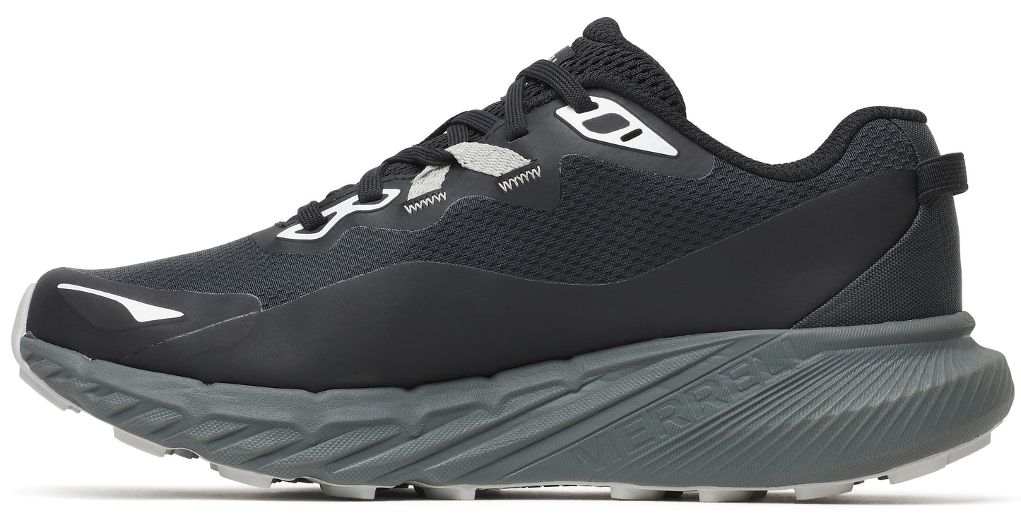 A black and gray running shoe with mesh and synthetic upper, reflective accents, and thick patterned sole.