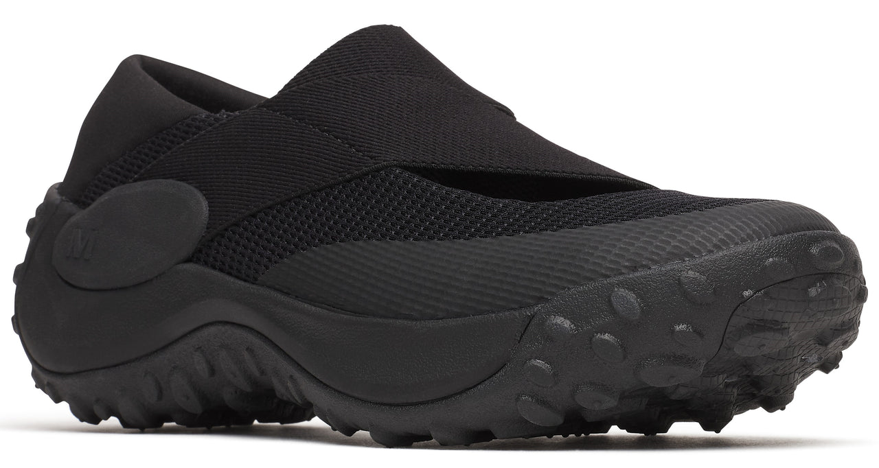 All-black slip-on shoe with elastic strap, thick sole, and round protrusions.