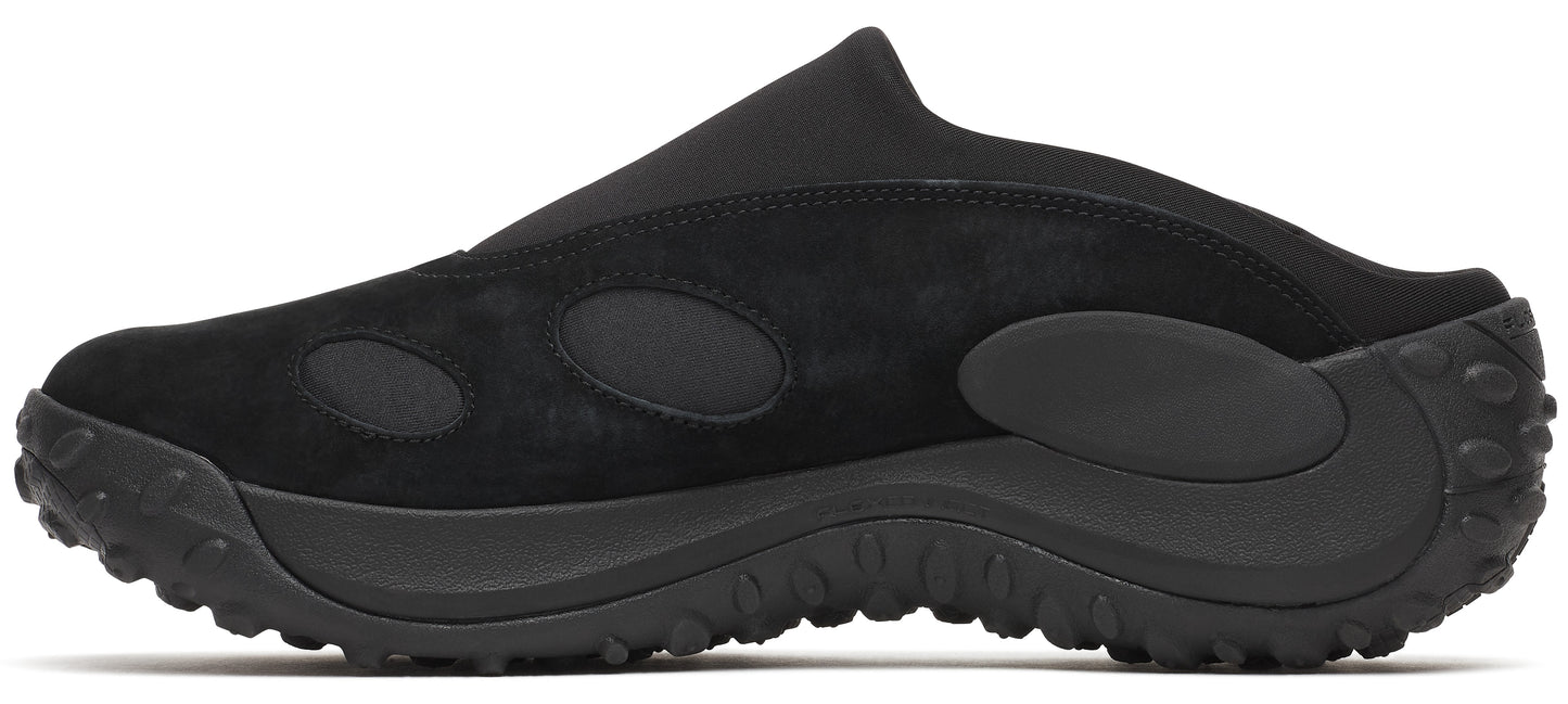 Black slip-on shoe with suede upper and thick, nubbed sole.