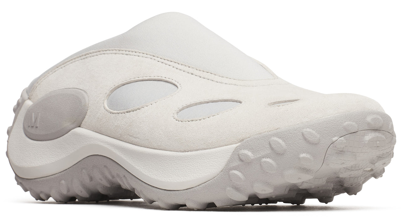 Off-white textured slip-on shoe with oval openings.