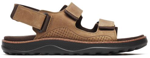 A brown sandal with a thick black sole.
