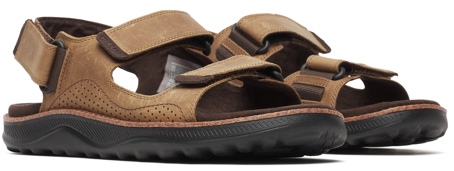 A pair of brown leather sandals with black soles and velcro straps.