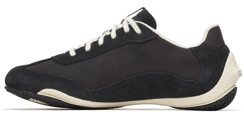 A black and white sneaker with white laces.