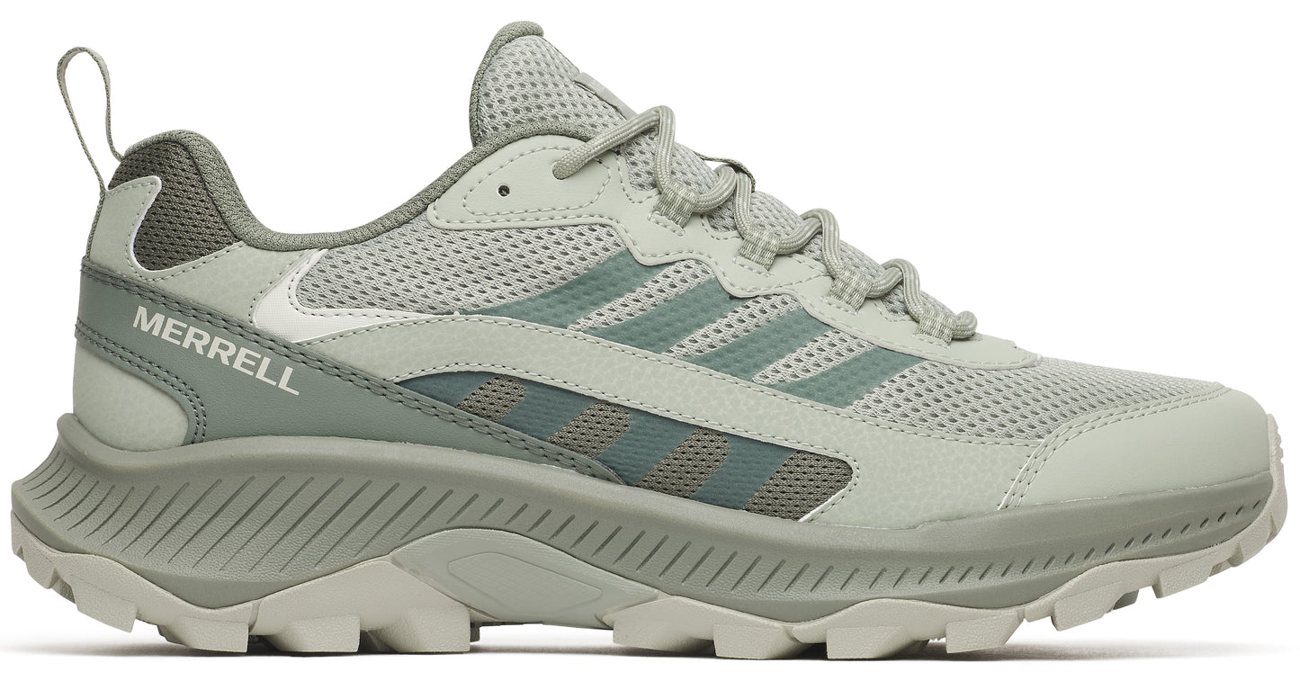A light sage green athletic hiking sneaker featuring mesh upper panels, synthetic overlays, a padded collar, a thick treaded sole, and the word MERRELL printed on the side.