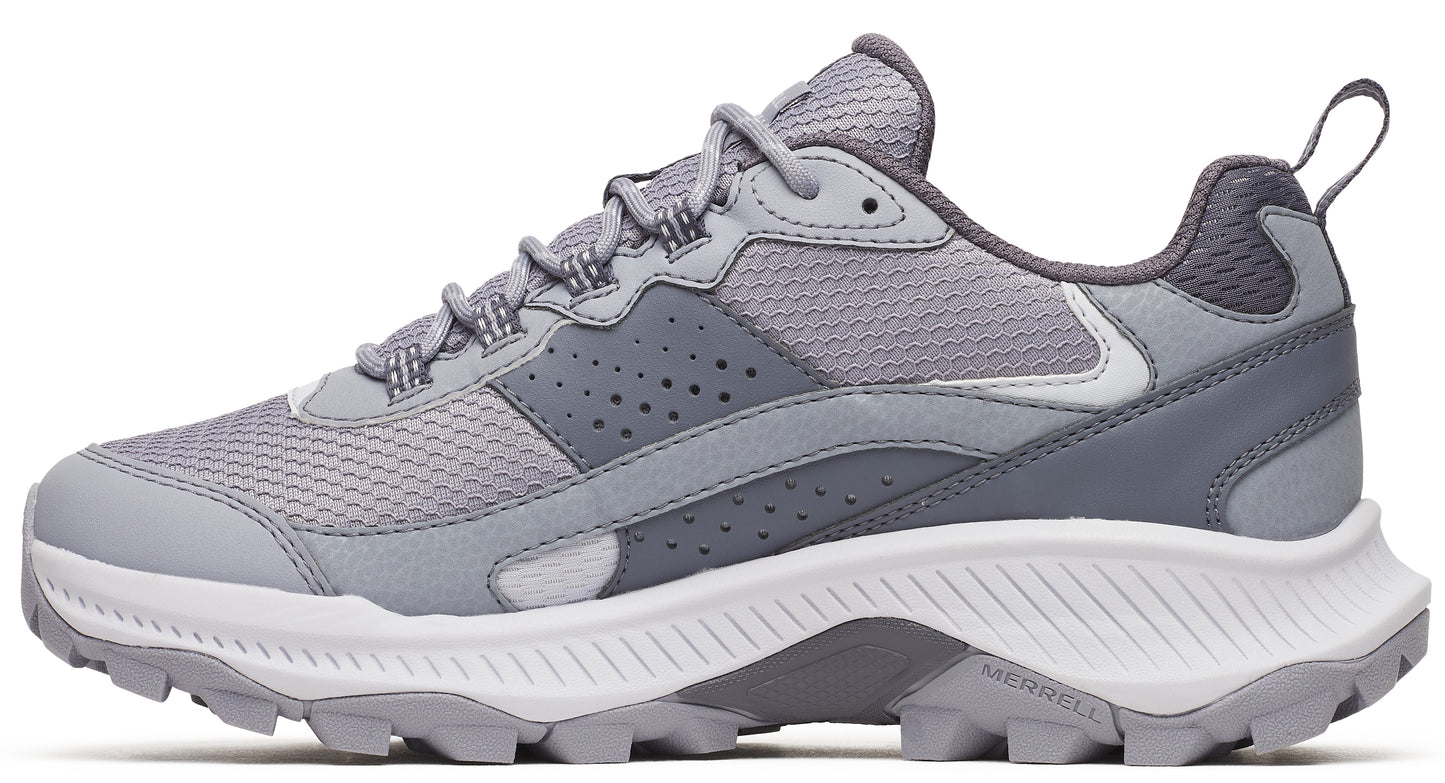 A gray low-rise hiking shoe with a white sole and gray laces.