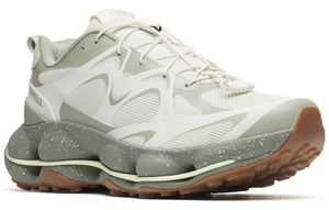 Low-profile trail running shoe in white and sage green featuring a lace-up closure and a thick sole with green bubble-like accents.