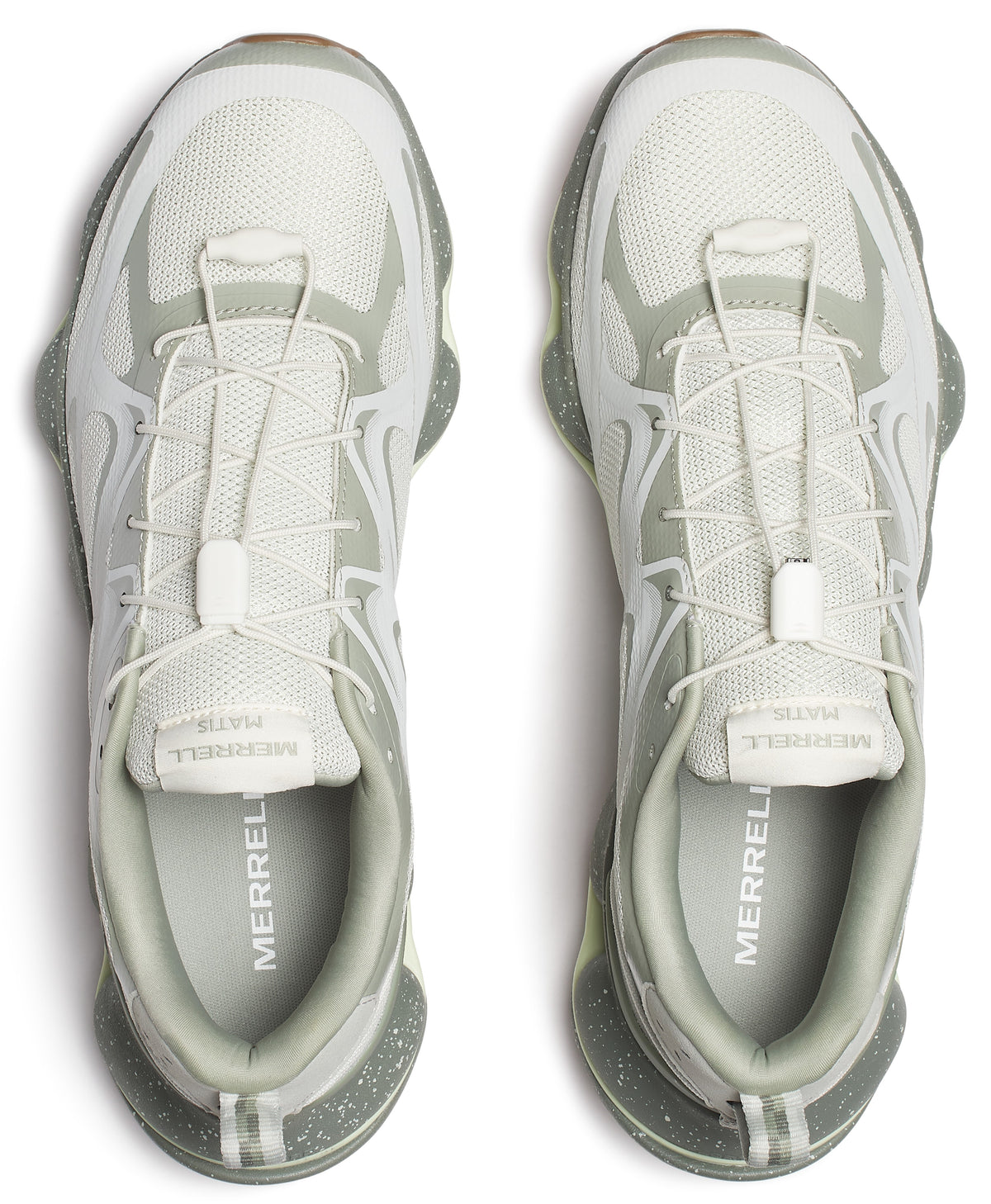 Two white athletic shoes with gray accents and toggle laces, viewed from above. The word "MERRELL" is printed on the inside of the heel.
