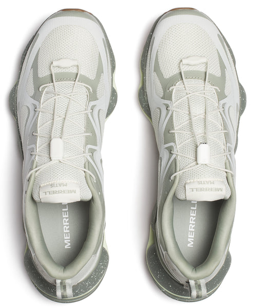 Two white athletic shoes with gray accents and toggle laces, viewed from above. The word "MERRELL" is printed on the inside of the heel.