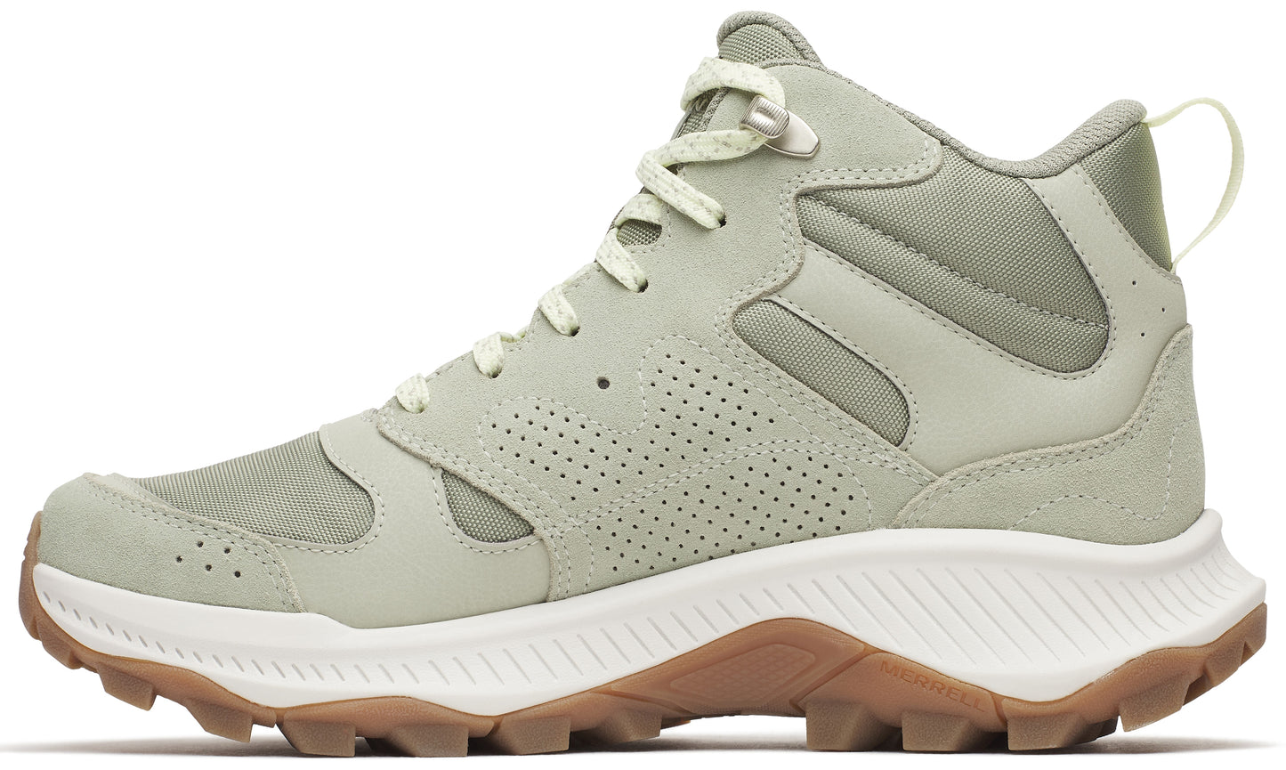 A light green hiking boot with perforations and a white and brown sole.