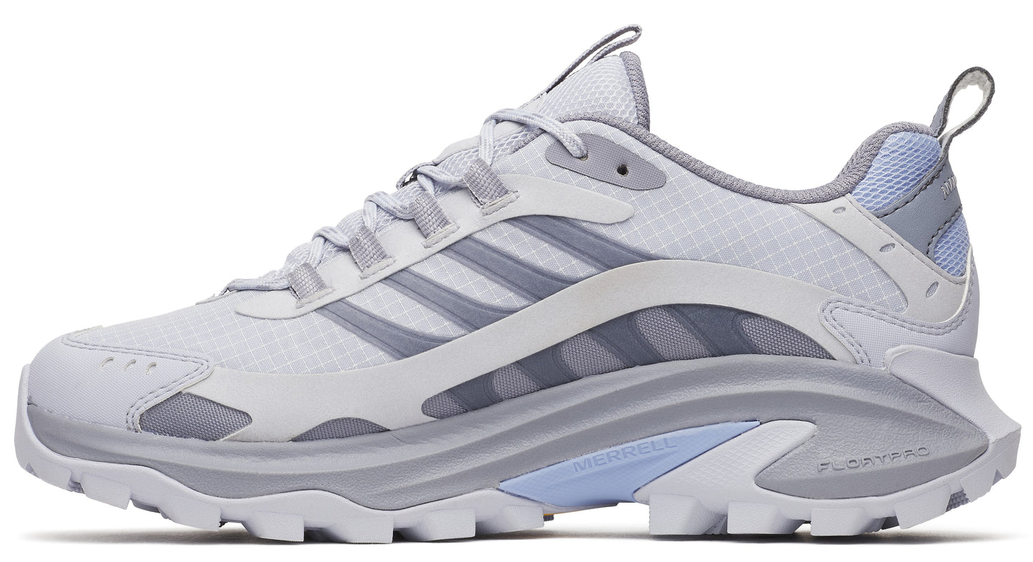 Trail running shoe with a white and light gray upper and a light gray outsole with aggressive lugs.