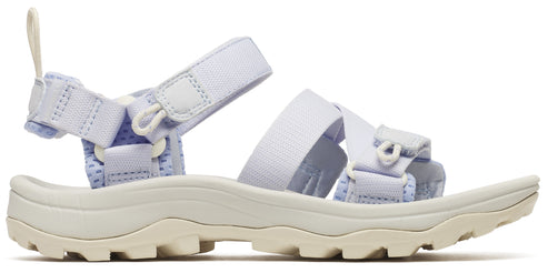 A light purple sandal with adjustable straps and a thick, beige sole.