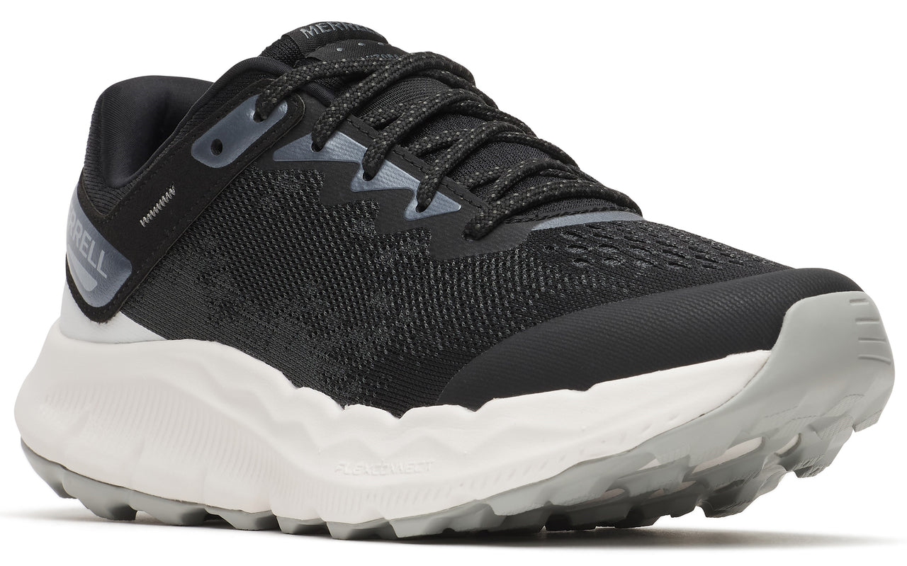 A low-profile running shoe with a black mesh upper, a thick white midsole, and a gray outsole.