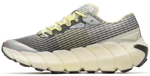 Side view of gray and white running shoe with yellow laces and sculpted cream colored sole.