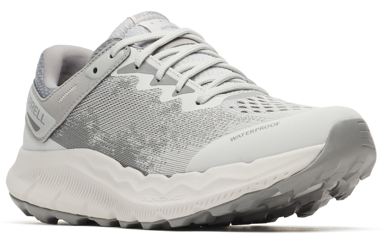 Low profile running shoe, light gray with thick white midsole and gray sole, waterproof.