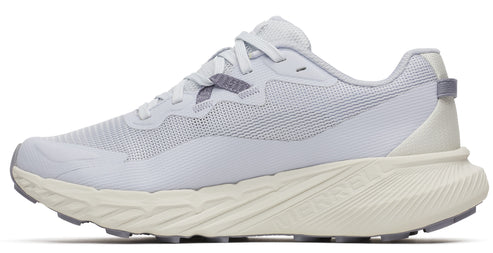 A white trail running shoe with a textured sole.