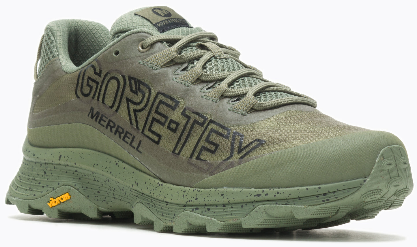 Trail running shoe with green tones, featuring GORE-TEX lettering and a Vibram sole.
