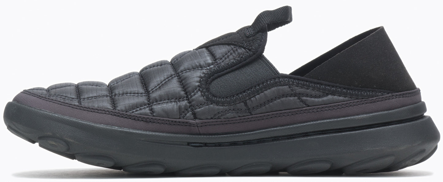 A black quilted slipper with a back strap.