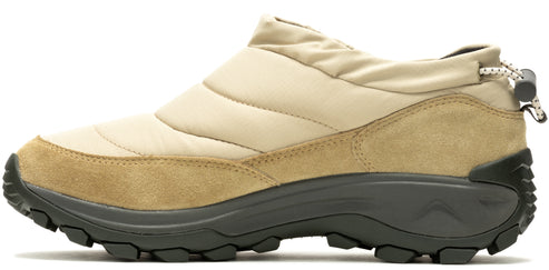 A slip-on shoe with a tan suede-like material around the base, a puffy beige upper and a black sole.