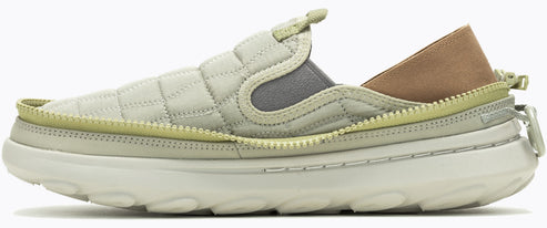 Beige quilted sneaker with a zipper detail and a cream colored sole.