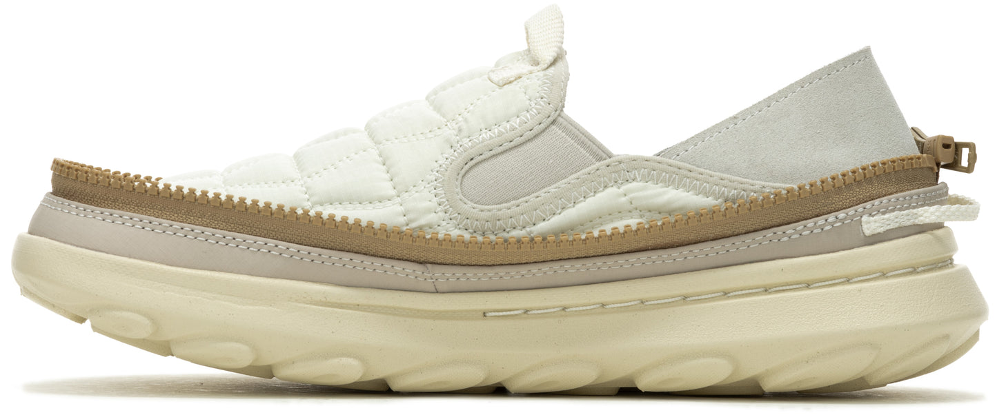 a slip-on shoe with quilted material and a thick, layered sole
