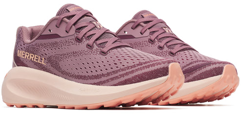 Pair of mauve sneakers with thick soles.