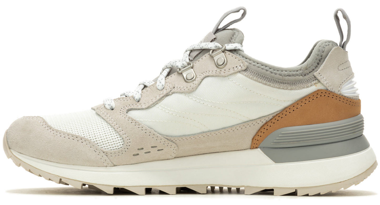 Off-white athletic shoe with suede and mesh upper, lace-up closure, and ridged white sole.