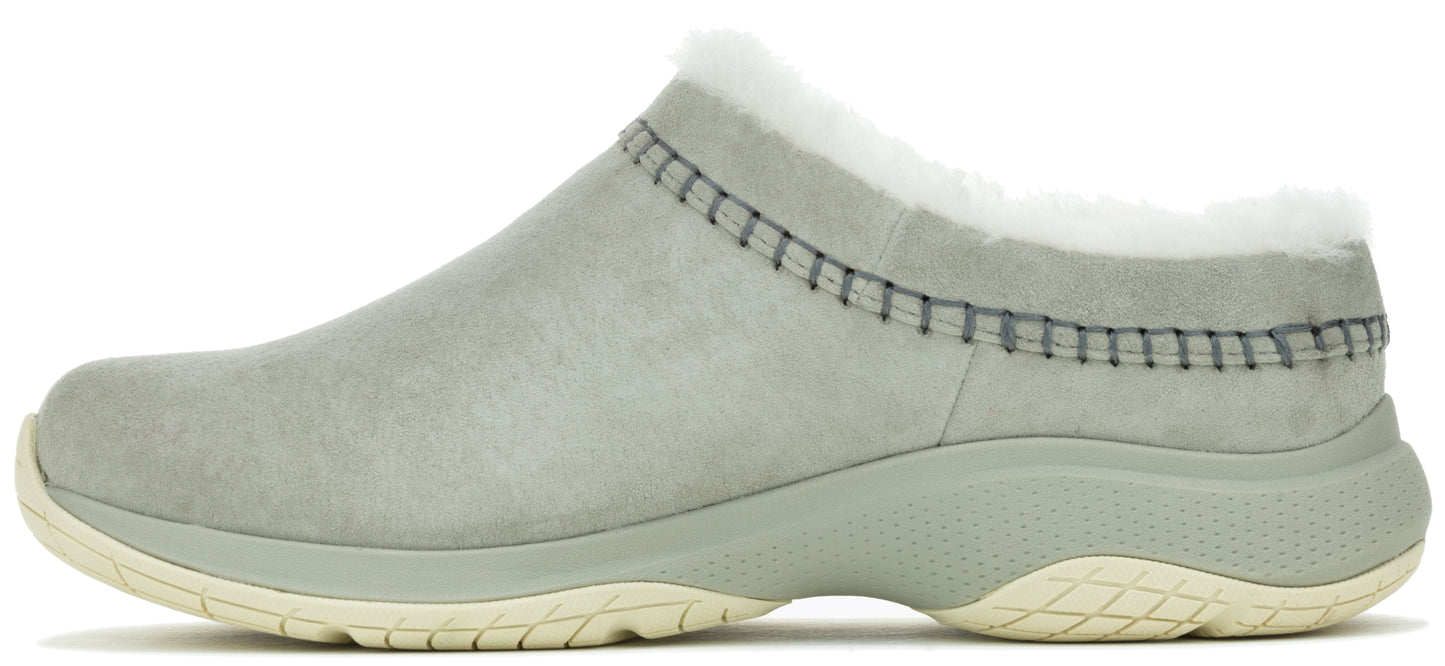 A grey slip-on shoe with white fur lining.