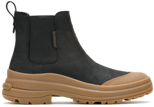 Chelsea style ankle boot in black with a thick tan sole.