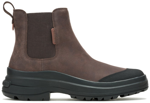 A brown, suede ankle boot with black elastic panels and thick, lugged soles.