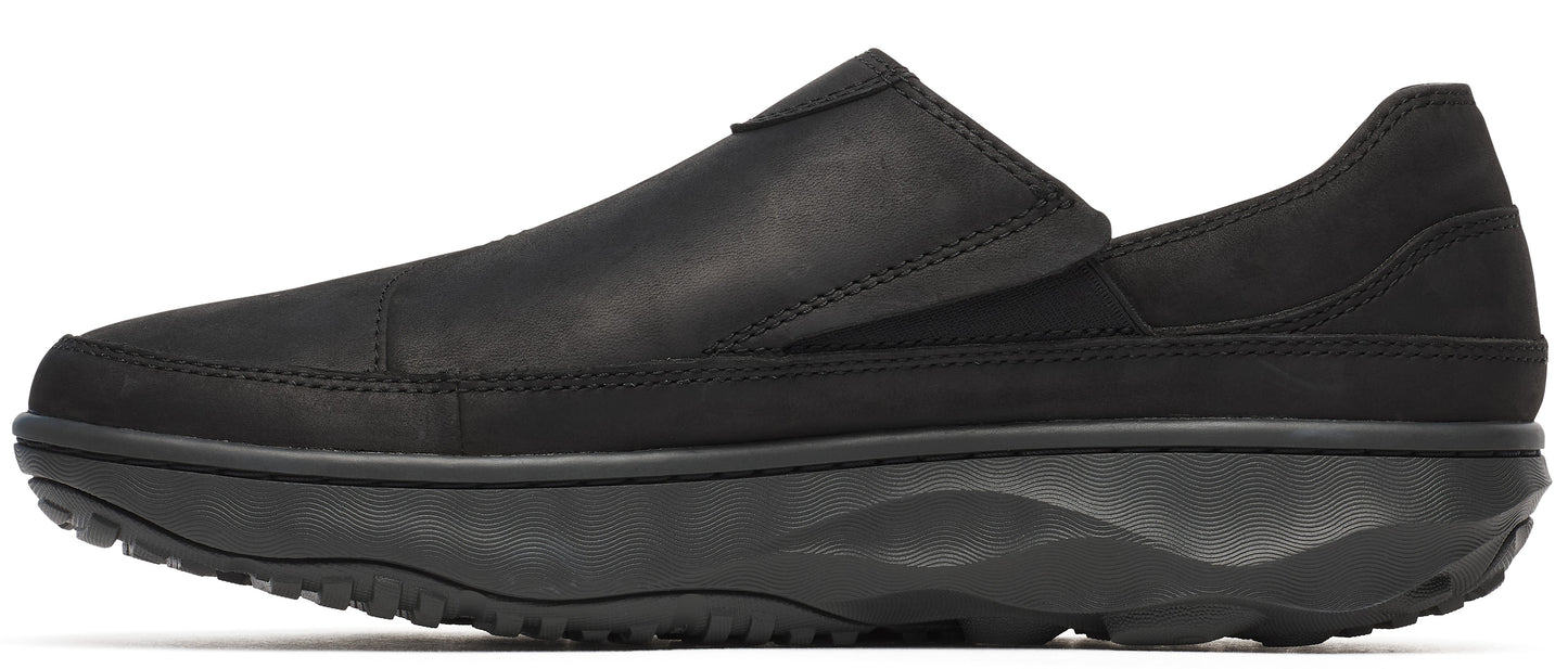 Black slip-on shoe with thick sole.