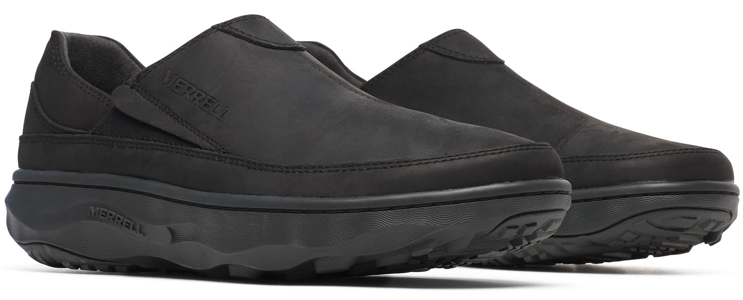 A pair of black slip-on platform shoes.