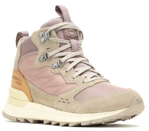 A high-top hiking boot featuring a light beige sole, a light beige suede vamp and trim, light pink nylon side panels, and silver metal eyelets.