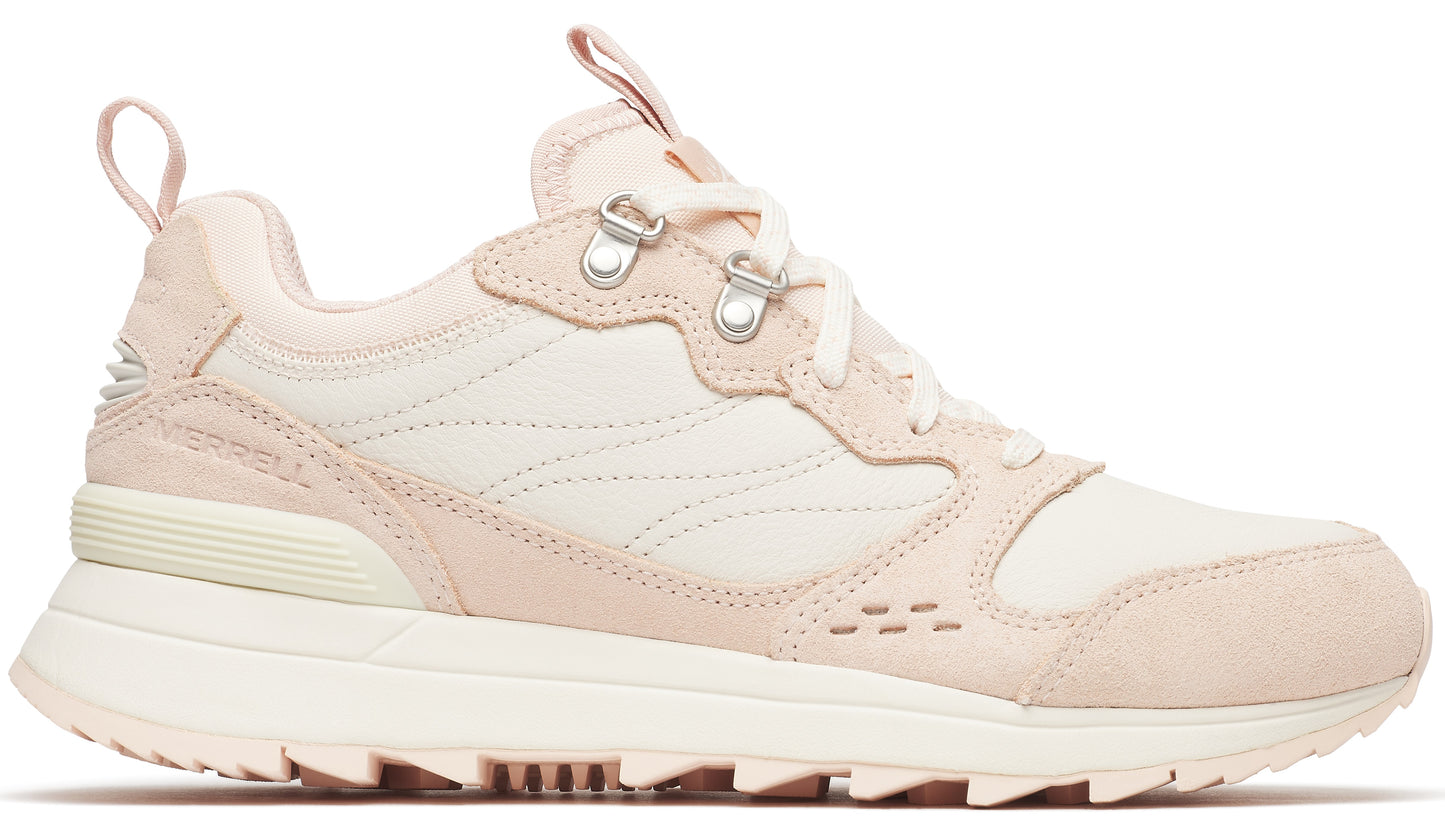 Off-white and blush-pink athletic shoe with metal eyelets and lug sole.