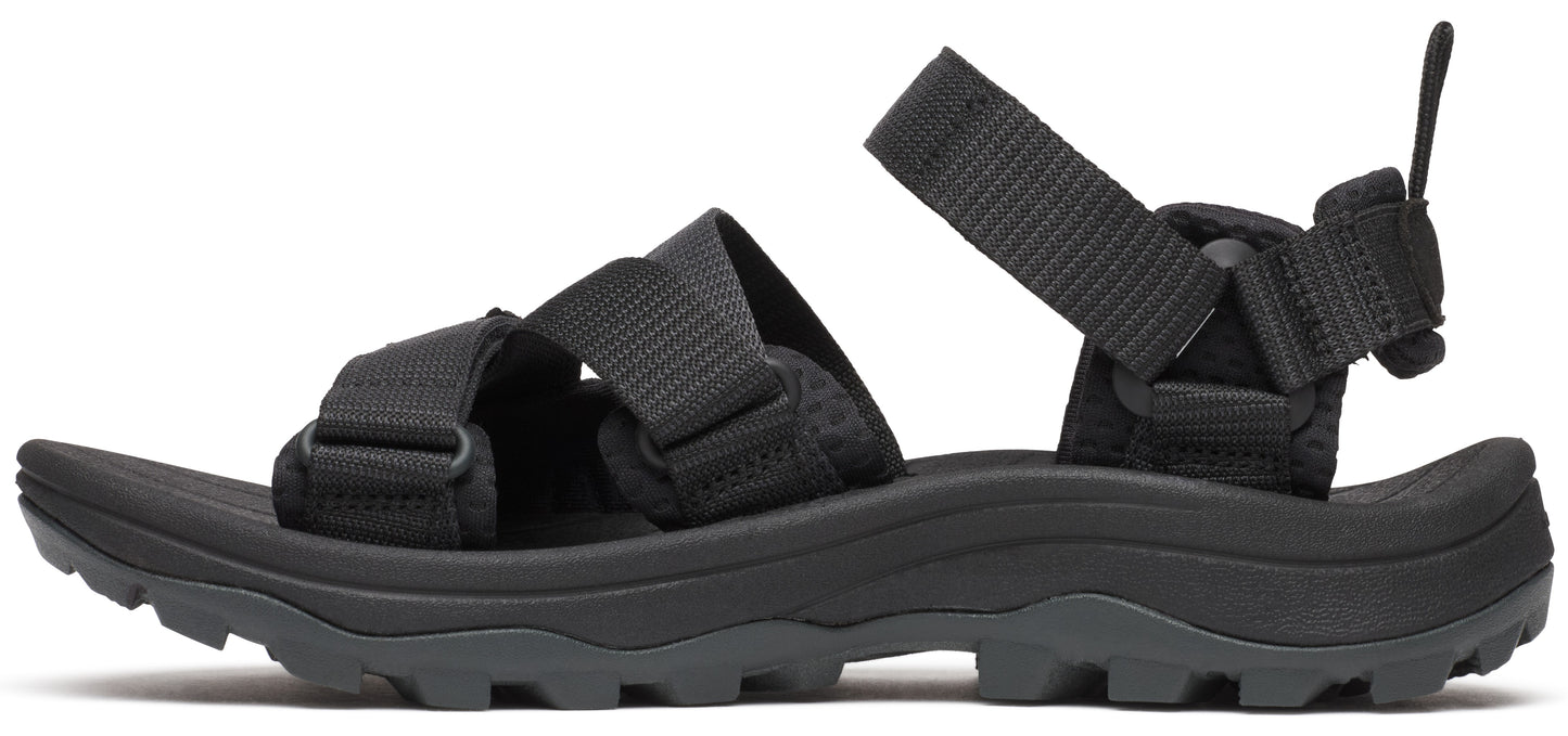 Side view of a black sandal with black straps.