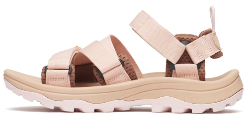 A sandal with pink straps and a ridged sole.