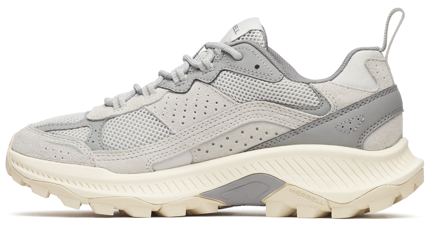 Grey sneaker with white rugged sole, suede and mesh upper, pull tab, and lace-up closure.