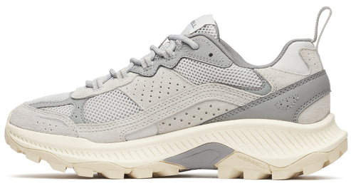 Grey sneaker with white rugged sole, suede and mesh upper, pull tab, and lace-up closure.
