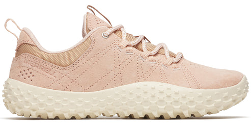 A pink sneaker with a bumpy white sole.