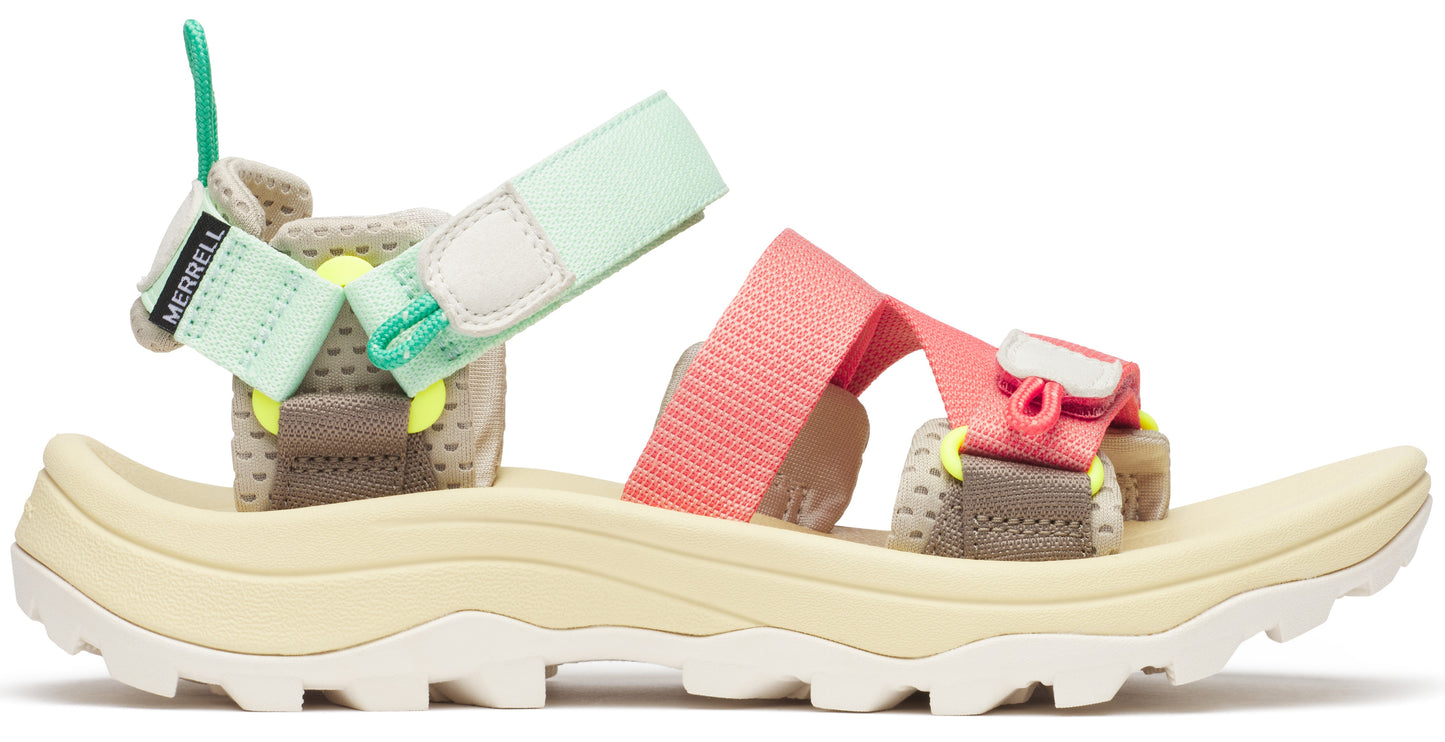 Side-profile view of open-toed beige sandal with white soles and adjustable pink and green straps.