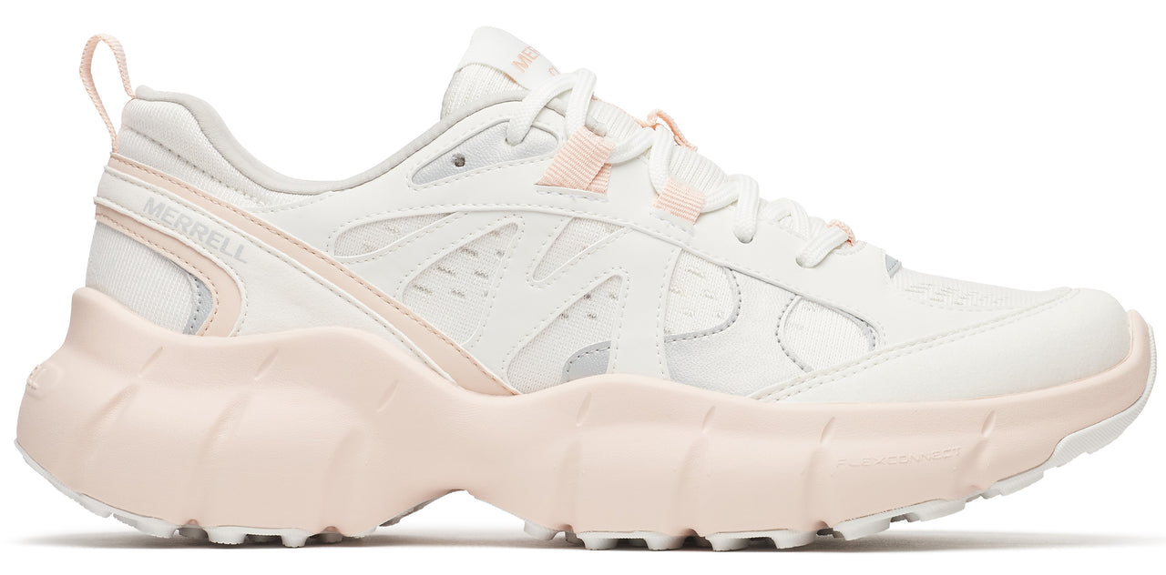 A white shoe with a pink sole.