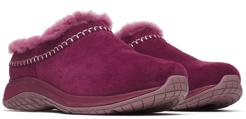 A pair of magenta slipper shoes with faux fur trim.