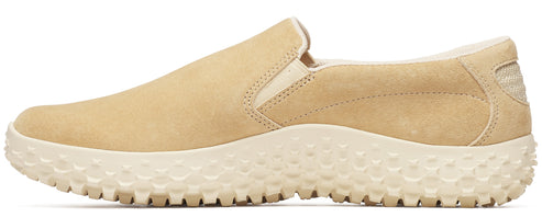 Beige slip-on sneaker with a chunky, textured sole.