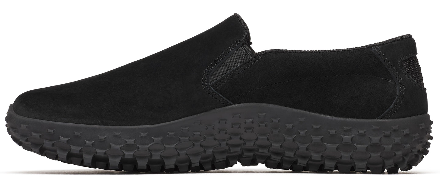 A black slip-on shoe with a thick, heavily textured sole.